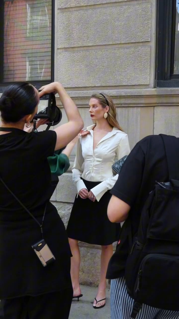 Photographer and crew shooting the model on a West Village street