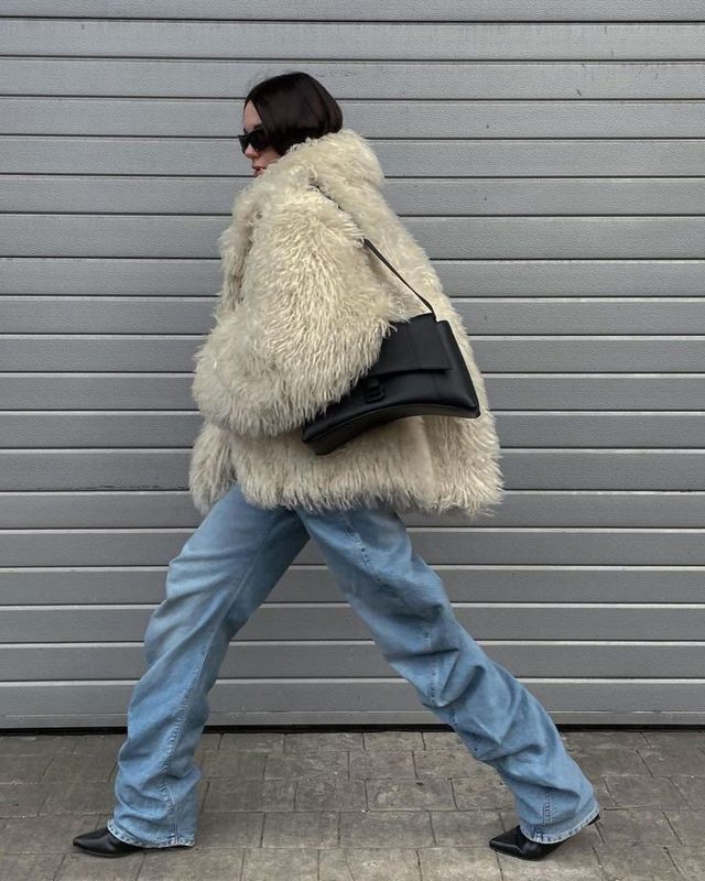 Street style reference: shaggy cream coat with relaxed jeans