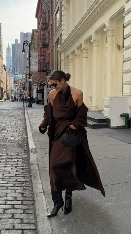 Full date-night look walking a SoHo street with the sculpted bag